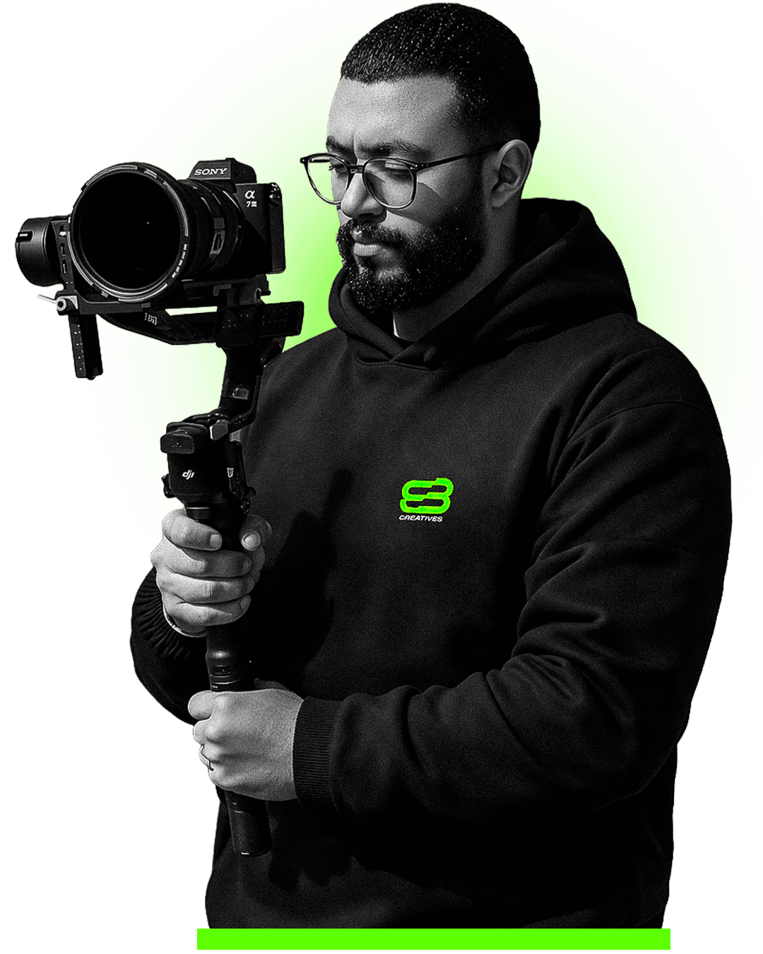 Portrait of Saad Ben Hadj holding a camera